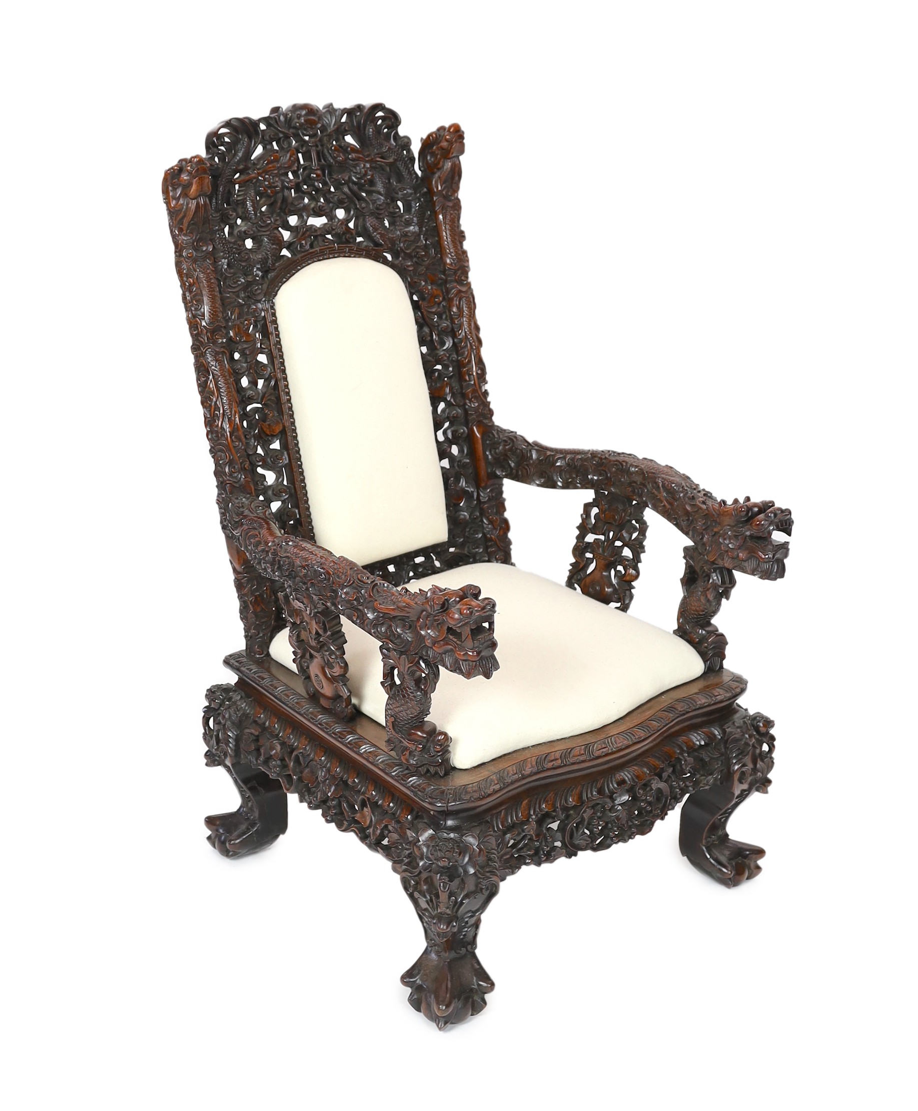 A good Chinese hardwood ‘dragon’ throne armchair, c.1900, 114.5cm high, 68cm wide at the arms